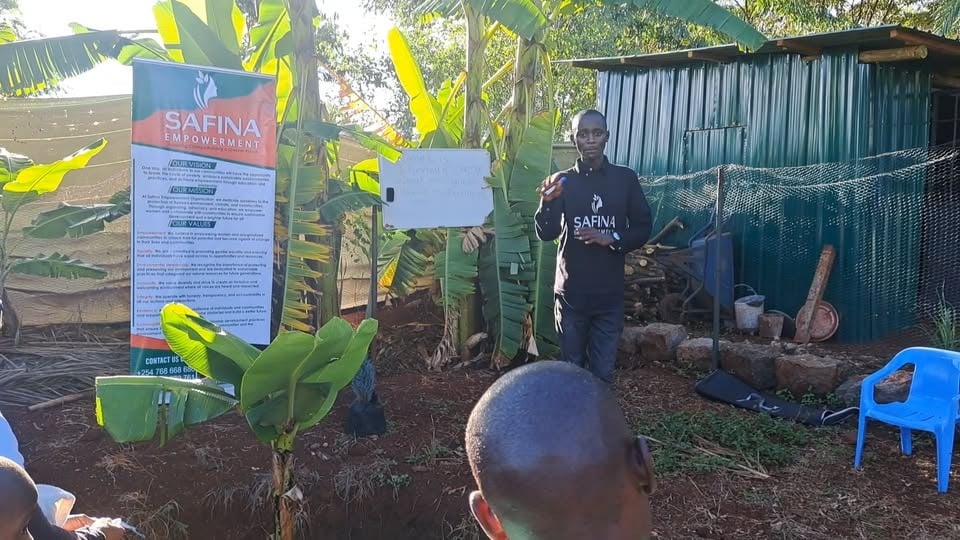 Safina community training beside a kitchen garden