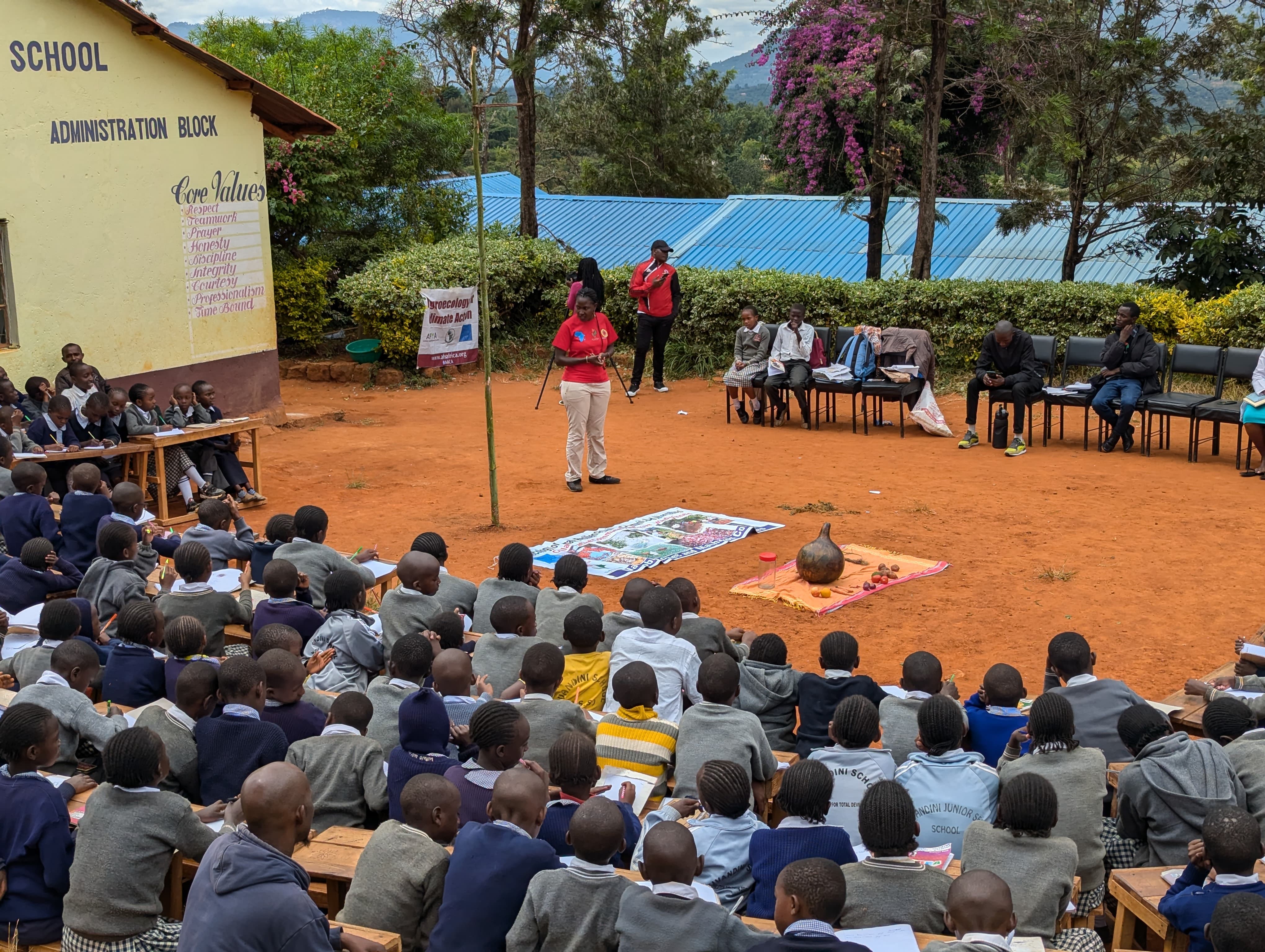 An outdoor Safina learning session at a school