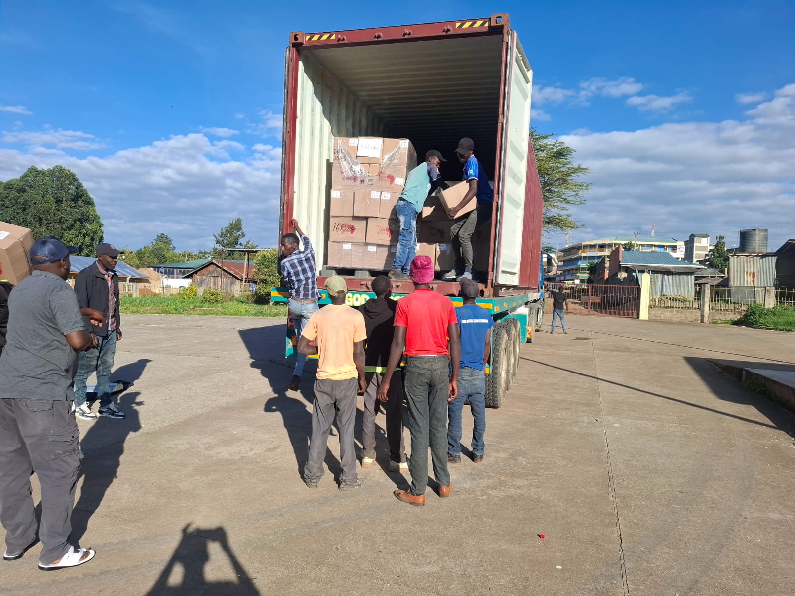 Safina team offloading books and education resources